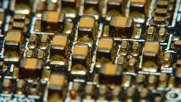 close up of a circuit board with many electronic components photo