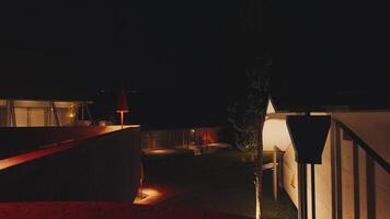 Modern Nighttime Architecture with Illuminated Pathways video