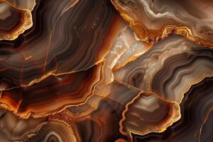 abstract background made of brown marble with golden veins photo