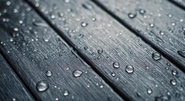 Water droplets on textured wooden surface after rain photo