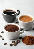 Three cups of coffee with roasted beans on a white background photo