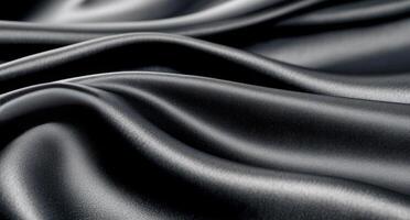 Elegant black satin fabric draping softly in natural light photo