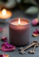 Soft candlelight with scattered rose petals and vintage keys during twilight hours photo