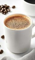 Hot coffee in a white cup with coffee beans floating on the surface photo