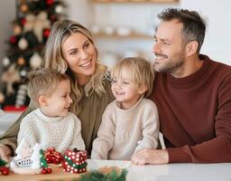 Family Portrait Taken Indoors During Holiday Season With a Young Child and Warm Smiles photo
