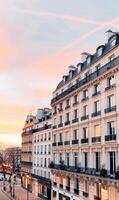 Charming Parisian Architecture Under Sunset Skies in Autumn photo