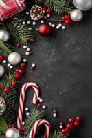 Festive Holiday Decorations With Gifts and Ornaments on Dark Surface photo