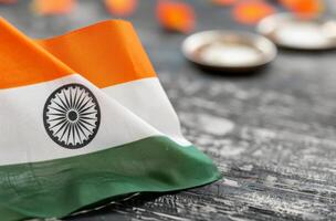 Indian National Flag Draped on a Rustic Wooden Surface photo