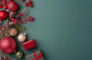Festive Arrangement of Christmas Decorations and Gifts on Dark Green Background photo