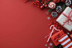 Festive Christmas Decorations With Gifts and Candy Canes on Red Background photo