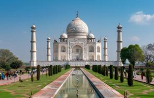 Majestic Taj Mahal at Sunrise Surrounded by Lush Gardens in Agra, India photo