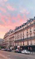 Sunset Over Parisian Street With Classic Architecture in the Evening photo