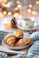 Cozy Morning With Coffee and Croissants by Twinkling Lights photo