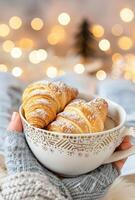 Cozy Morning With Coffee and Croissants by Twinkling Lights photo