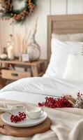 Cozy Bedroom Decor With Red Berries and Candle on Nightstand During Winter photo