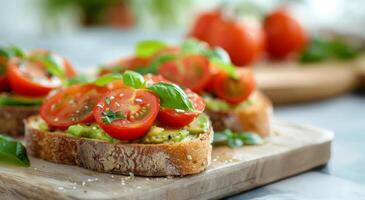 Fresh Avocado Toast Topped With Sliced Tomatoes and Basil in a Bright Kitchen Setting photo