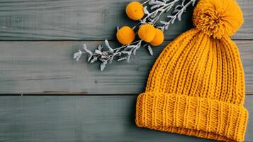 Cozy Knit Yellow Beanie on Wooden Surface in Natural Light photo