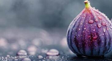 Fresh Fig With Dew on a Surface Surrounded by Soft Bokeh Background photo