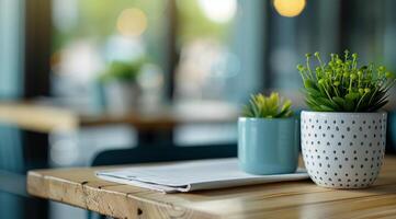 Indoor Plants in Silver and Black Pots on a Wooden Table With Decorative Lights photo