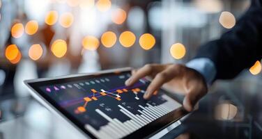 Business Professional Analyzing Stock Market Data on Tablet in Modern Office at Night photo