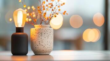 Decorative Table Arrangement With Warm Lighting and Floral Accent During Evening photo