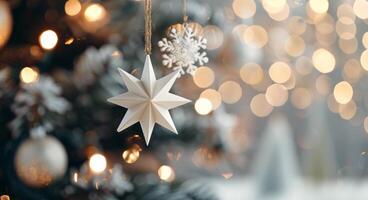 Golden Star Ornaments Glimmering on a Christmas Tree With Blurred Lights photo