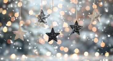 Glittering Stars Hanging Against a Soft Blurred Background During the Holiday Season photo