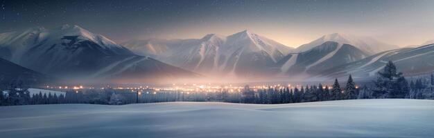 Snow-Covered Mountains at Dusk With Warm Glow in the Valley photo