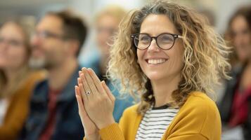 Smiling Woman Clapping at a Conference During Daytime Event photo