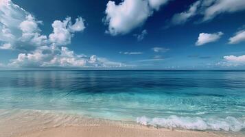 Tranquil Ocean View With White Sand Beach and Blue Sky in the Afternoon photo