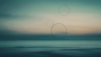 Hanging Modern Lights Illuminating Dusk Sky Over Calm Horizon photo