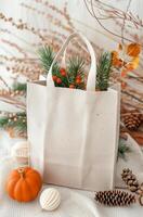 Christmas Gift Wrapped Elegantly in Front of Decorated Tree photo