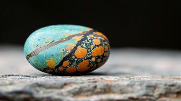 Colorful Marble Sphere on a Textured Surface in Soft Light photo
