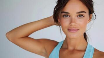 Portrait of a Smiling Woman With Natural Makeup in Soft Lighting photo
