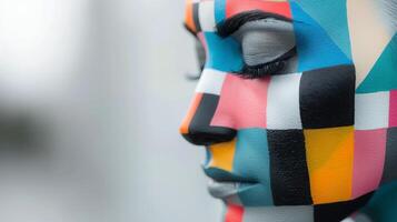 Colorful Abstract Face Art Displayed on a Mannequin in a Modern Studio photo