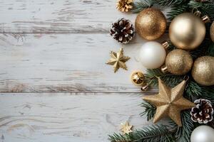Festive Gold And White Christmas Ornaments Arranged On Wooden Surface photo