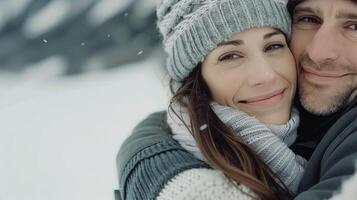 Couple Embracing in Snowy Mountain Landscape During Winter photo