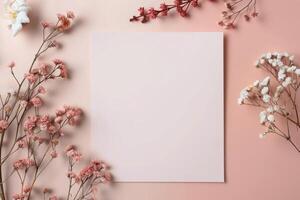 Floral Arrangement With Pink Background and Blank Canvas in Center photo