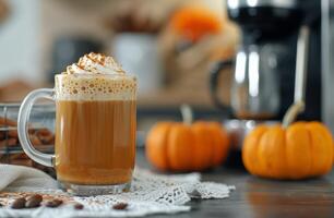 Pumpkin Spice Latte With Whipped Cream in Cozy Kitchen Setting During Autumn photo