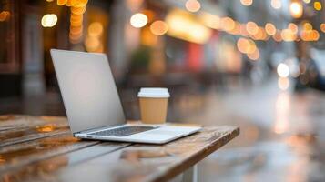 Person Working on Laptop With Coffee in Outdoor Setting During Daytime photo