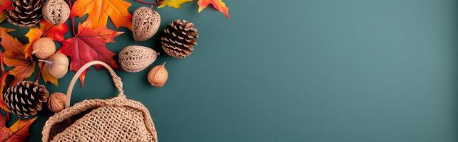 Autumn Floral Arrangement in Woven Basket on Wooden Table Against Teal Background photo
