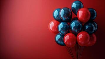 Red and Blue Balloons on Red Background photo