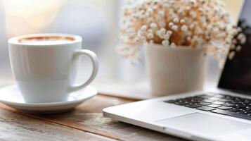 Person Working on Laptop With Coffee in Outdoor Setting During Daytime photo