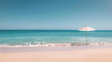 White Umbrella on Sandy Beach With Turquoise Water Under Clear Sky photo