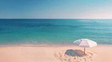 White Umbrella on Sandy Beach With Turquoise Water Under Clear Sky photo