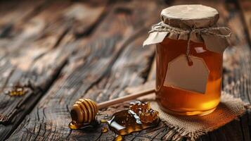 Jar of Honey With Wooden Spoon photo