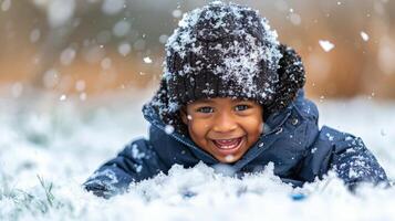 Young Child Sitting on Sled in Snow photo