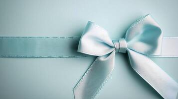 Elegant Mint Green Gift Box Tied With a Light Blue Ribbon photo