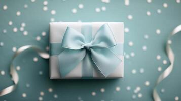 Elegant Mint Green Gift Box Tied With a Light Blue Ribbon photo
