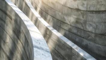 Man Riding Skateboard Down Side of Ramp photo